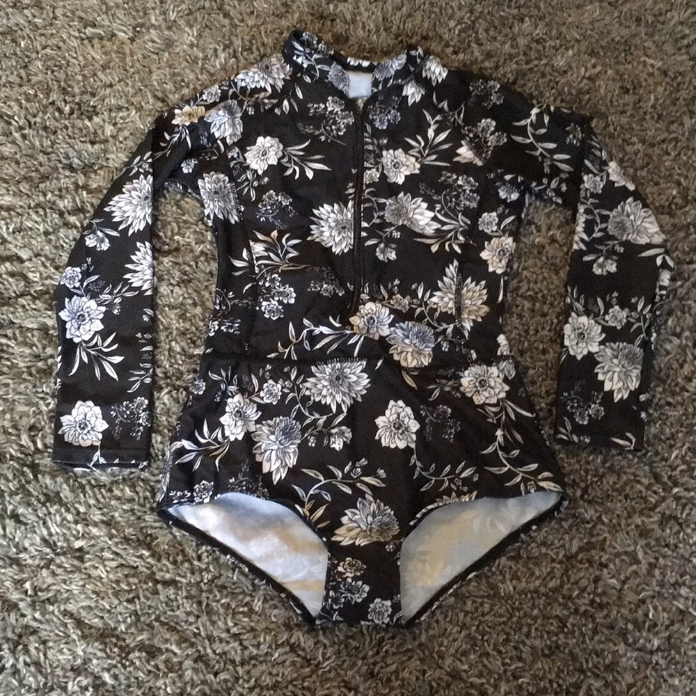 Black and white rash guard with flower pattern